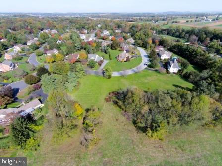 1339 Beaconfield Lane Lancaster, PA 17601 - Photo 3 of 9 a view of a lush green field with lots of trees