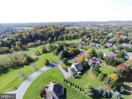 a view of a lake with a city