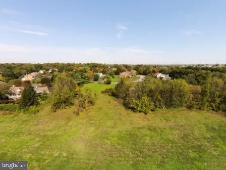 a view of city with ocean