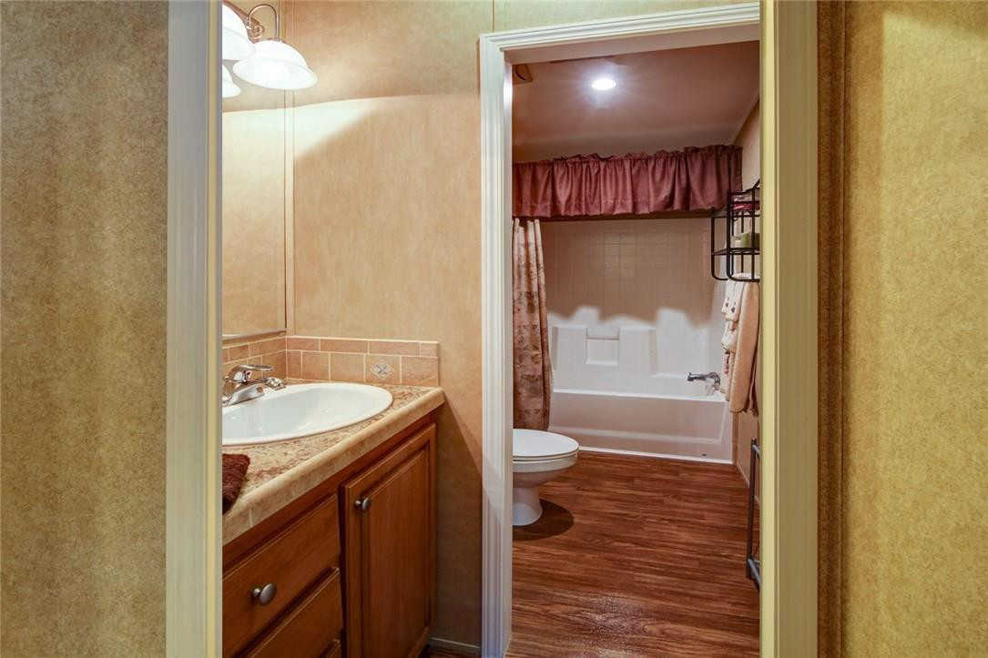 1600 Southwest 65th Avenue Boca Raton, FL 33428 - Photo 9 of 16 a bathroom with a sink a toilet and shower