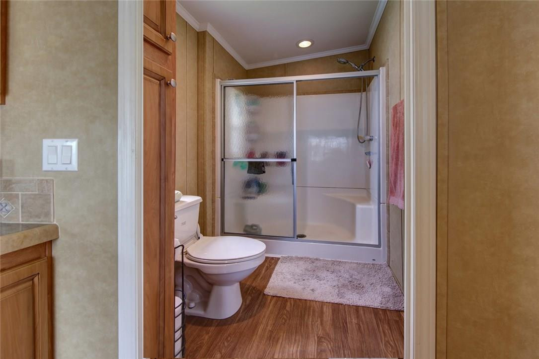 1600 Southwest 65th Avenue Boca Raton, FL 33428 - Photo 10 of 16 a bathroom with a shower and a toilet