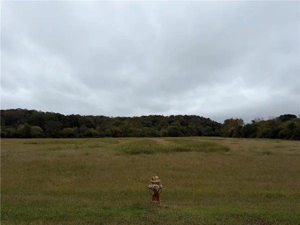 a view of a lake with mountain in the background