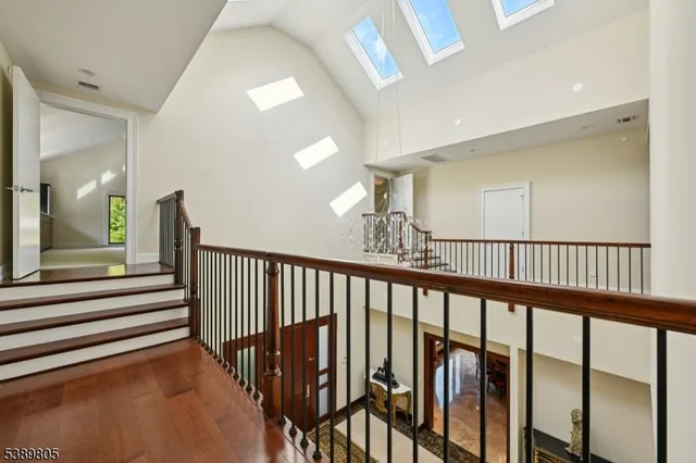 a view of a hallway with stairs