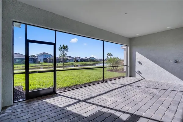 a view of swimming pool with wooden floor