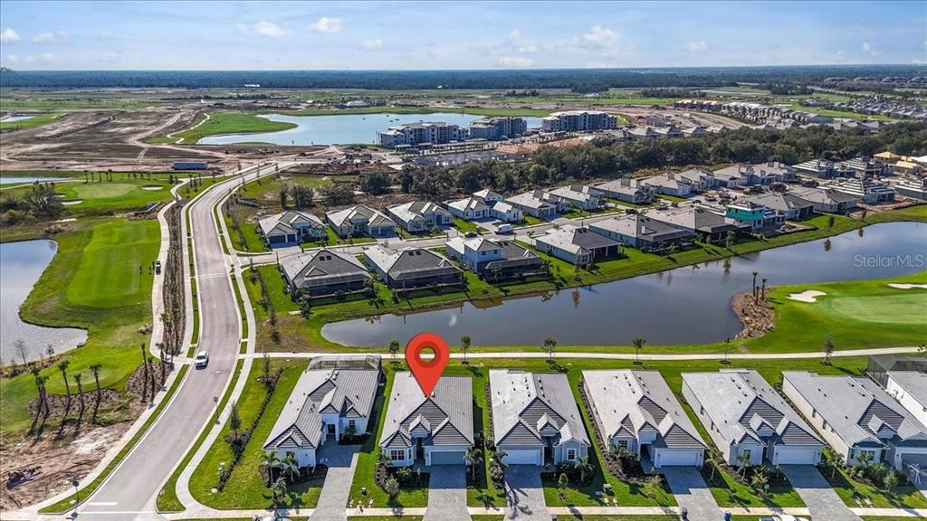 19168 Cherrystone Way Lakewood Ranch, FL 34211 - Photo 23 of 23 an aerial view of swimming pool a building and outdoor space