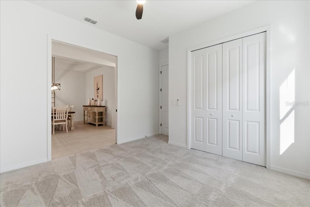19168 Cherrystone Way Lakewood Ranch, FL 34211 - Photo 8 of 23 a view of a bedroom with closet area