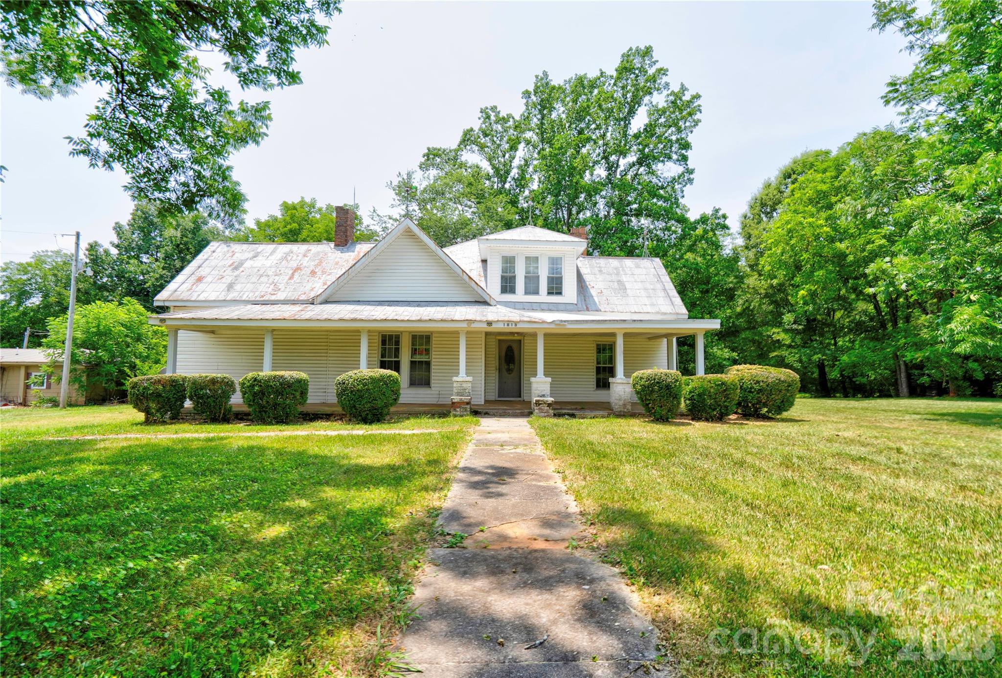 1813 St Marks Church Road Crouse, NC 28033 - Photo 1 of 22 a front view of a house with garden