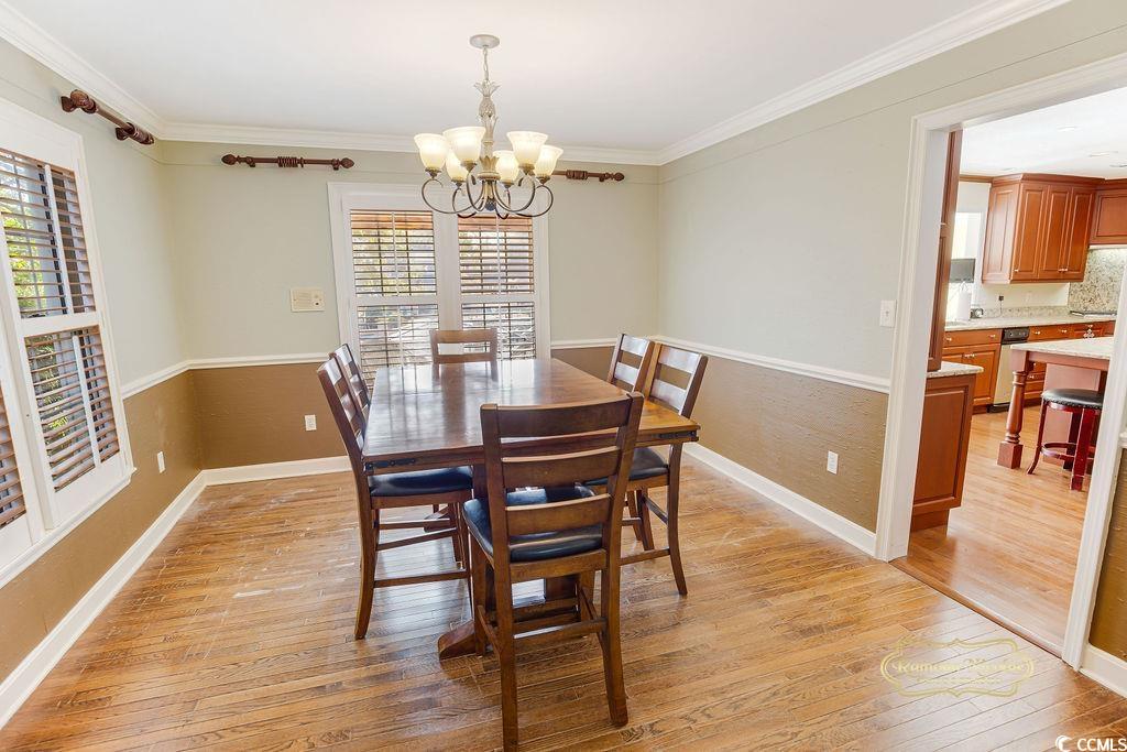 539 Old Field Road Murrells Inlet, SC 29576 - Photo 13 of 39 Dining room featuring an inviting chandelier, ligh
