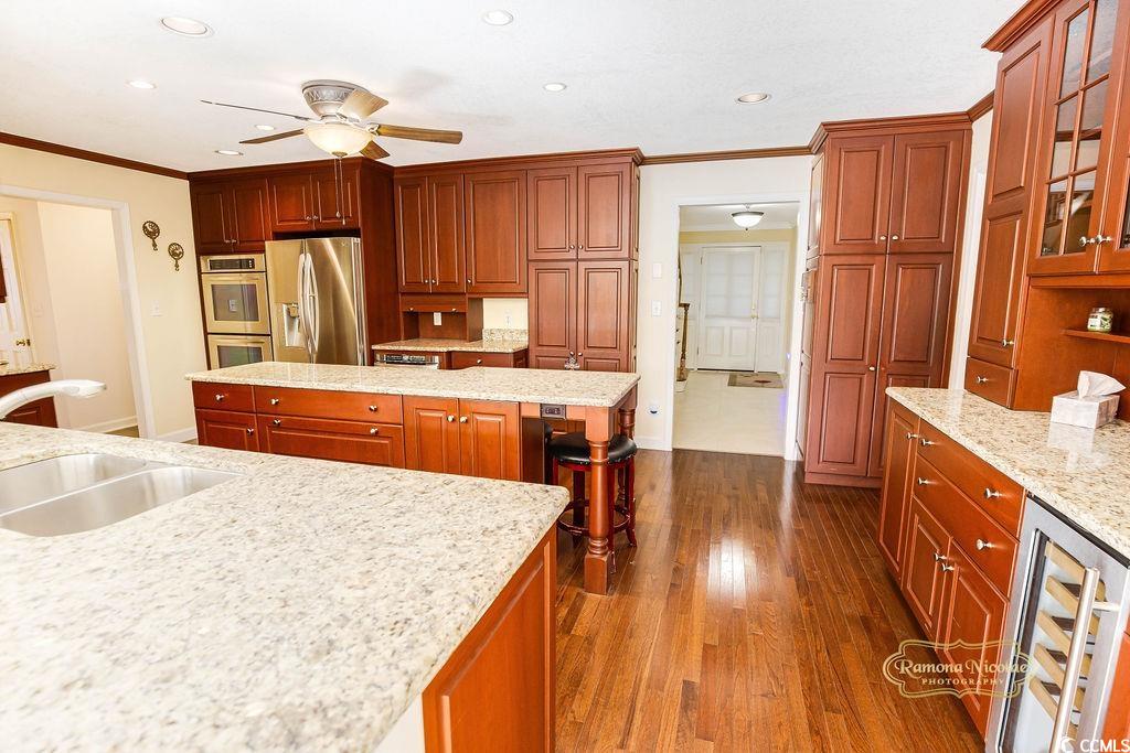 539 Old Field Road Murrells Inlet, SC 29576 - Photo 8 of 39 Kitchen featuring dark wood-type flooring, sink, o