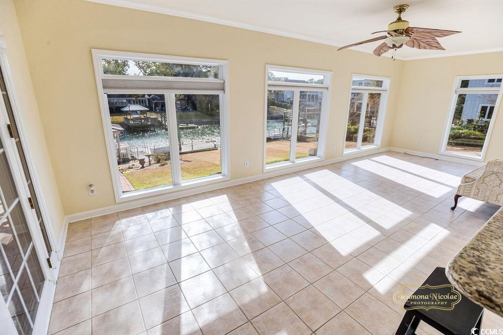 539 Old Field Road Murrells Inlet, SC 29576 - Photo 10 of 39 Unfurnished sunroom with ceiling fan and a water v