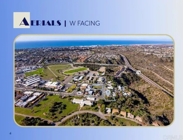 a view of a swimming pool with an outdoor seating