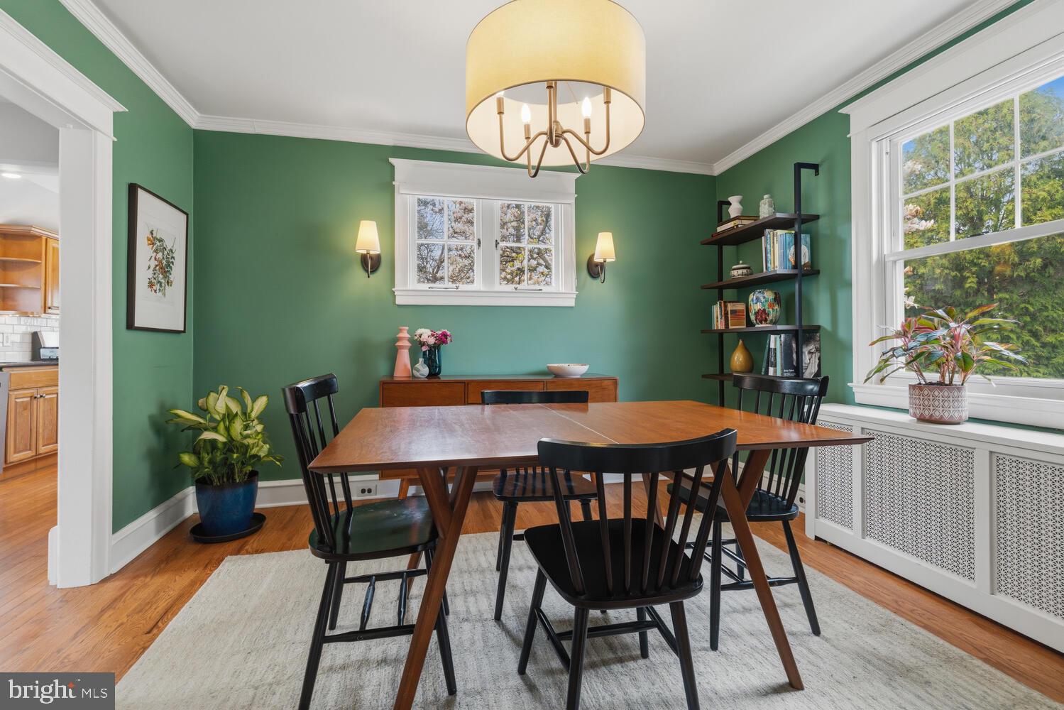 2116 East County Line Road Ardmore, PA 19003 - Photo 11 of 38 a view of a dining room with furniture window and wooden floor