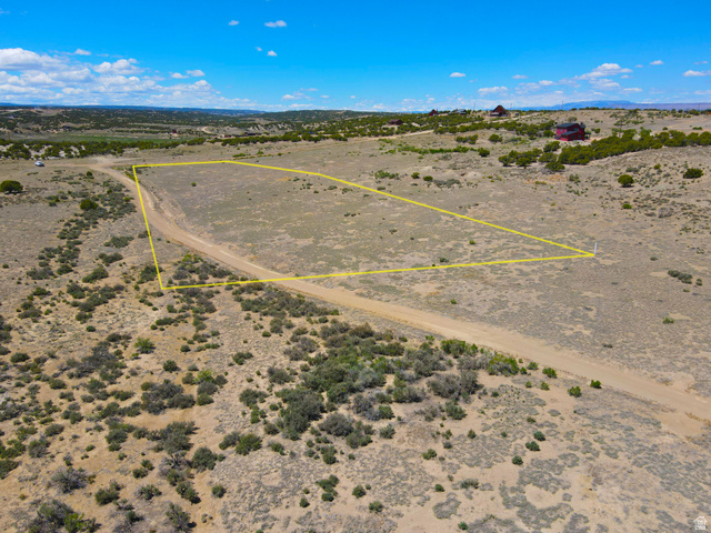 11714 South Coulton Road, Unit 12 Duchesne, UT 84021 - Photo 4 of 8 Aerial view of sparsely populated area with property parcel outlined and a desert landscape