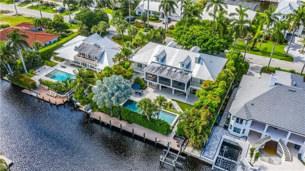 an aerial view of a house with a garden and plants