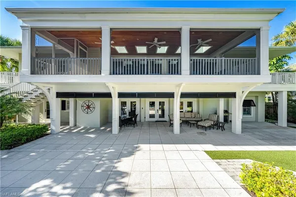 a view of a building with sitting area