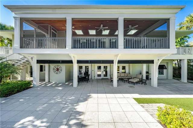 a view of a building with sitting area