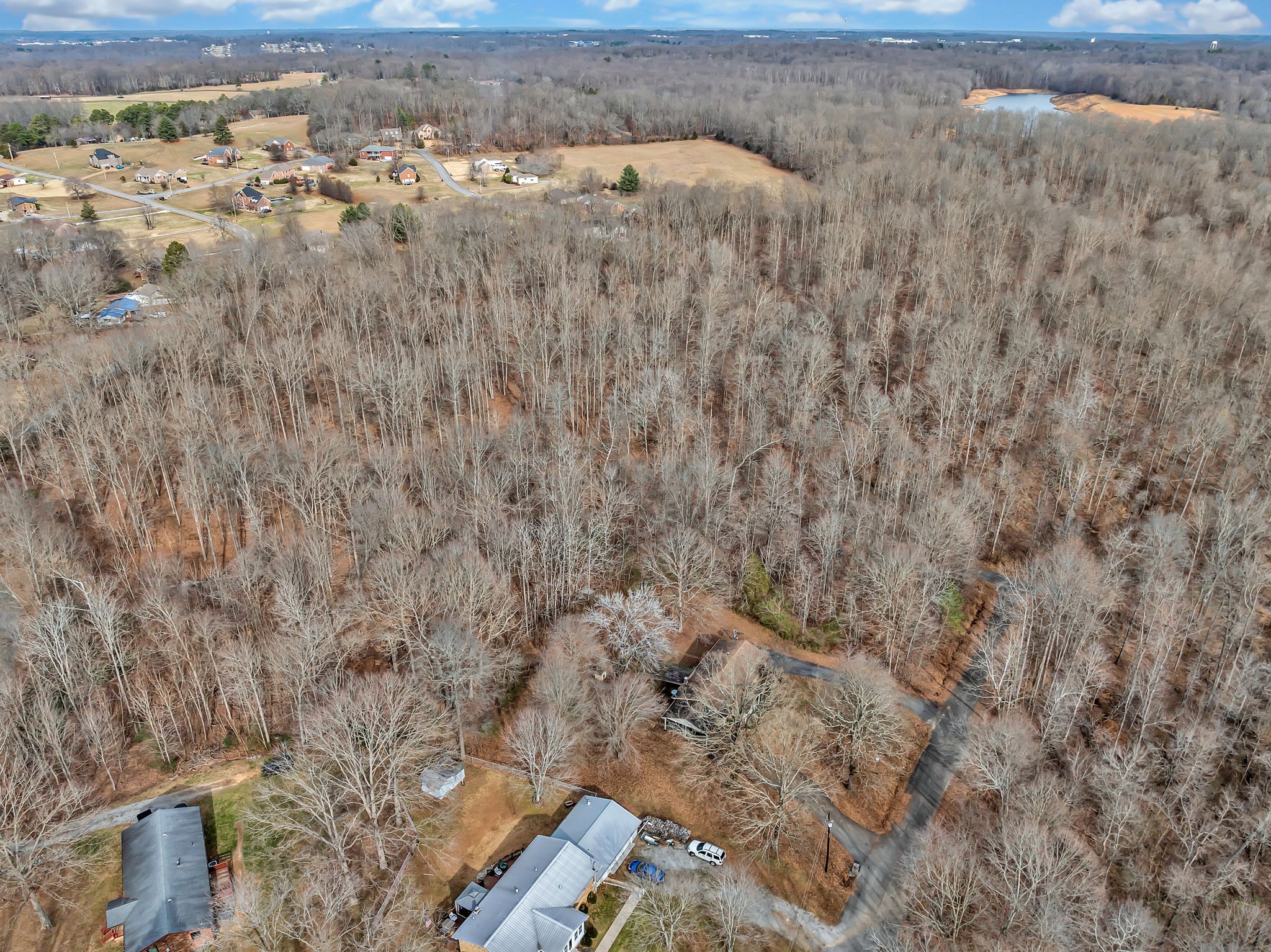 109 Cardinal Road Dickson, TN 37055 - Photo 9 of 49 a view of a houses with a yard