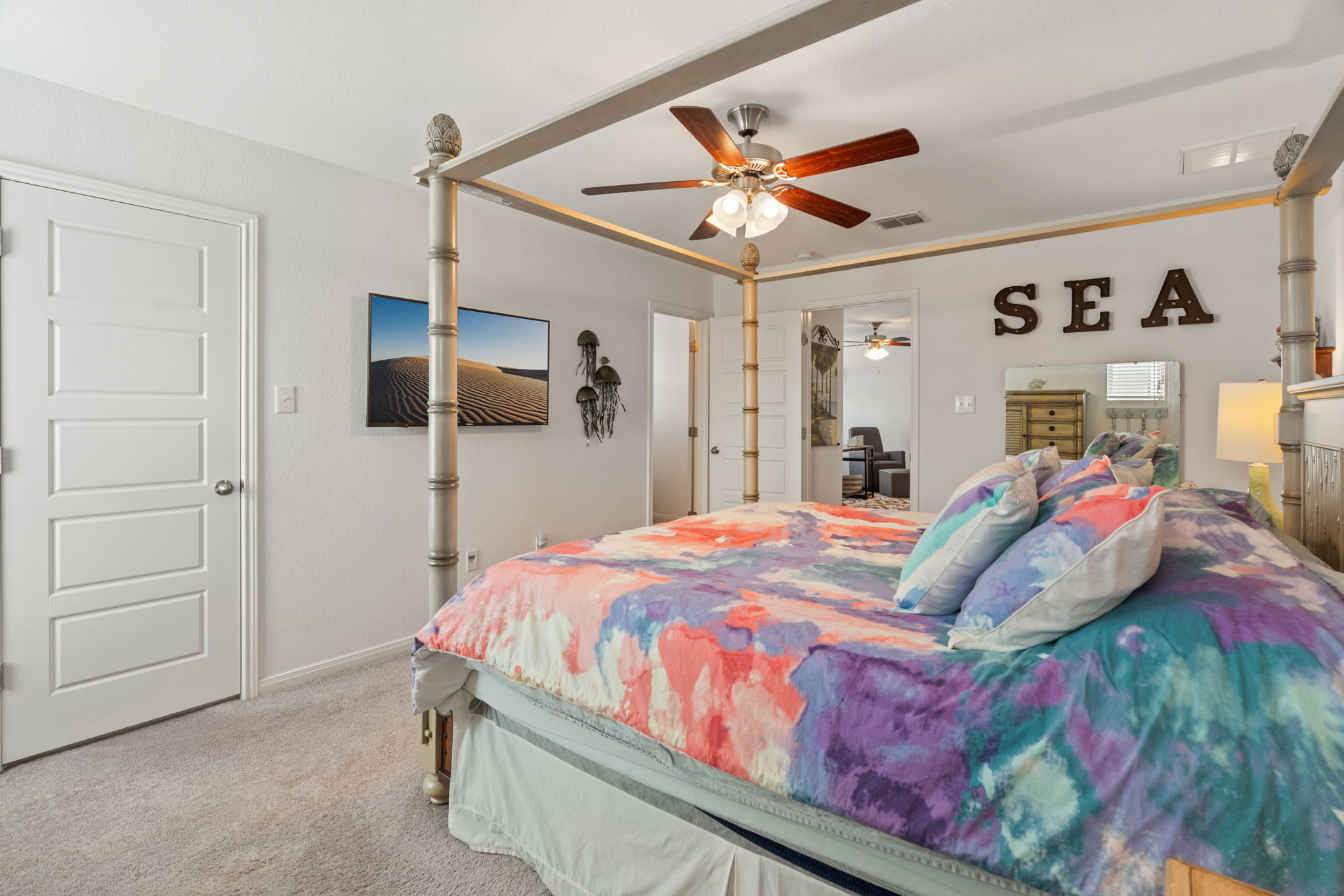 1306 Falconer Way Austin, TX 78748 - Photo 26 of 39 a bed room with a bed and a ceiling fan