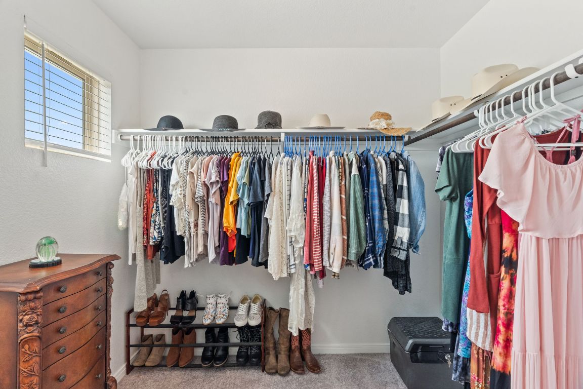 1306 Falconer Way Austin, TX 78748 - Photo 28 of 39 Enjoy a large walk-in closet with plenty of room for two.