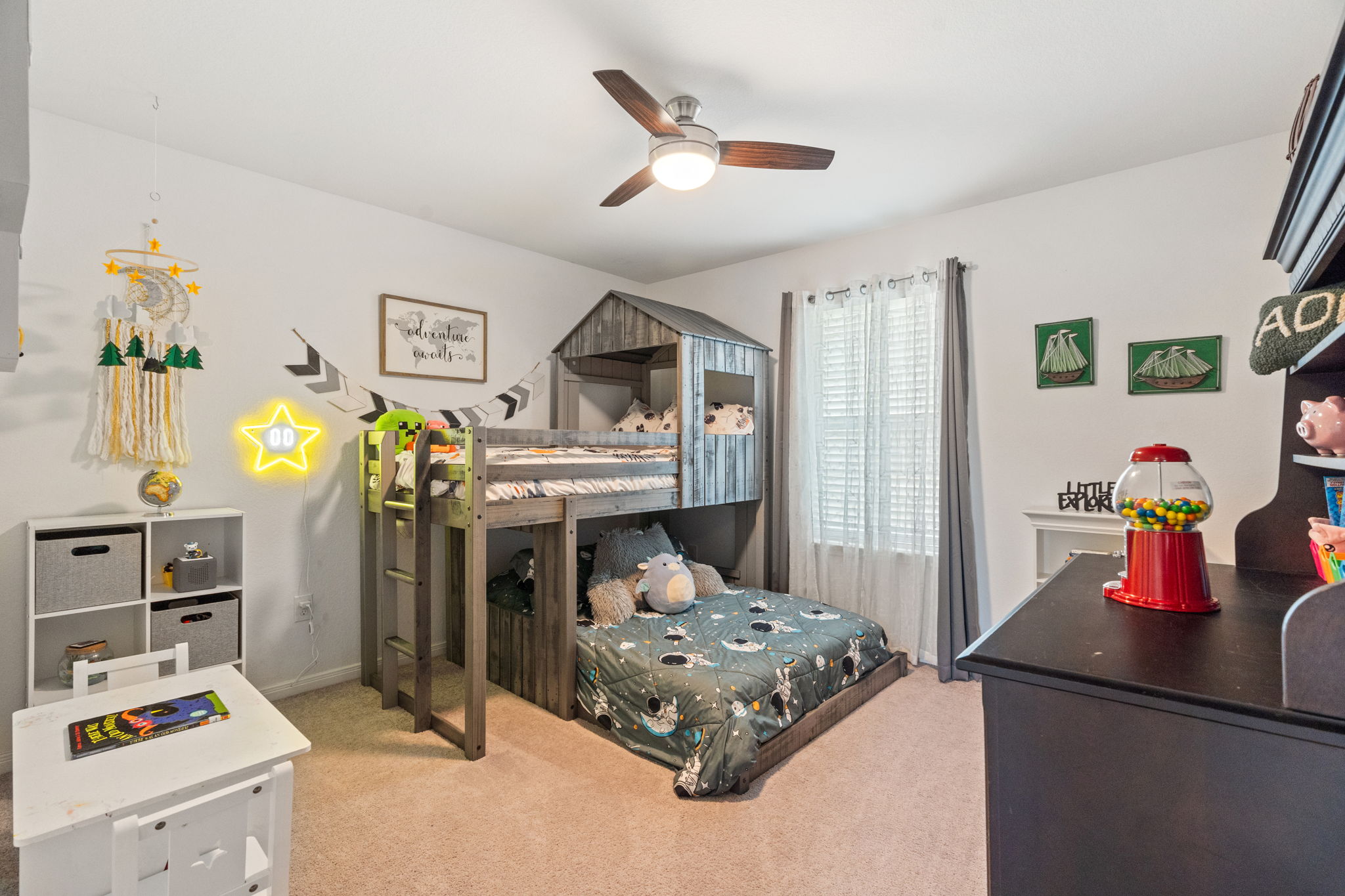 1306 Falconer Way Austin, TX 78748 - Photo 32 of 39 a bedroom with a bed and a flat tv screen