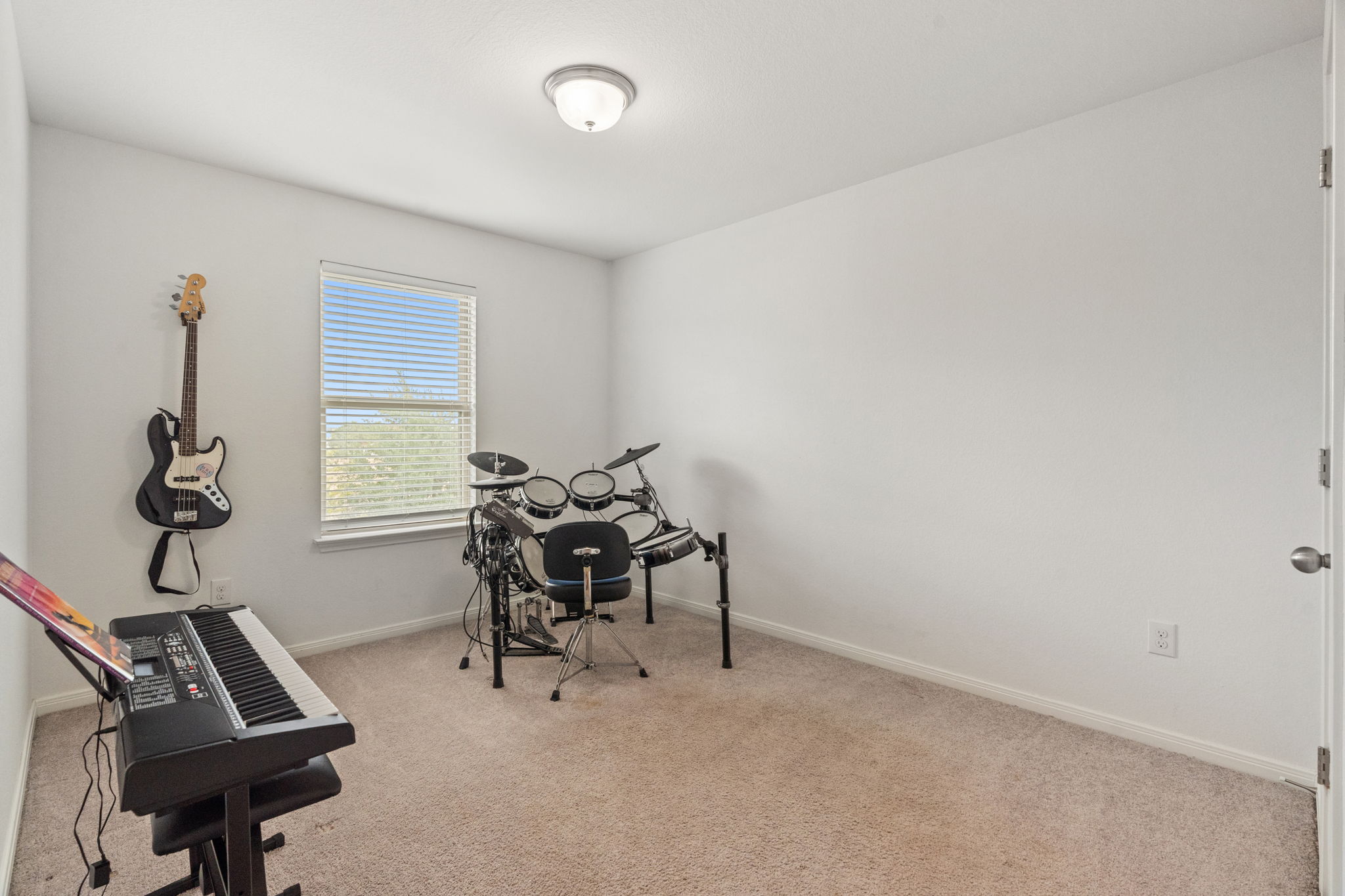 1306 Falconer Way Austin, TX 78748 - Photo 33 of 39 a view of a workspace with furniture and a window