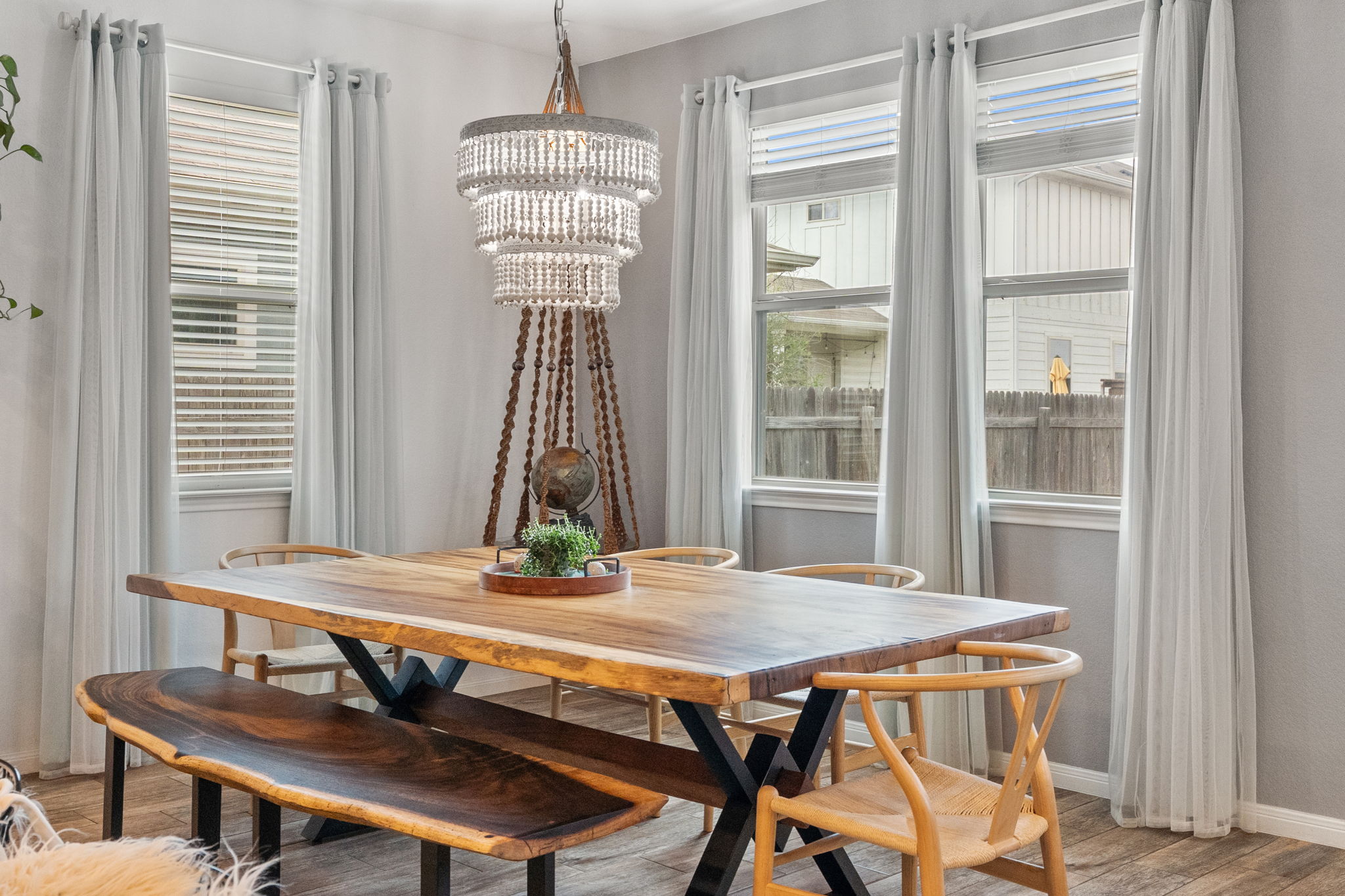 1306 Falconer Way Austin, TX 78748 - Photo 4 of 39 a view of a dining room with furniture window and wooden floor