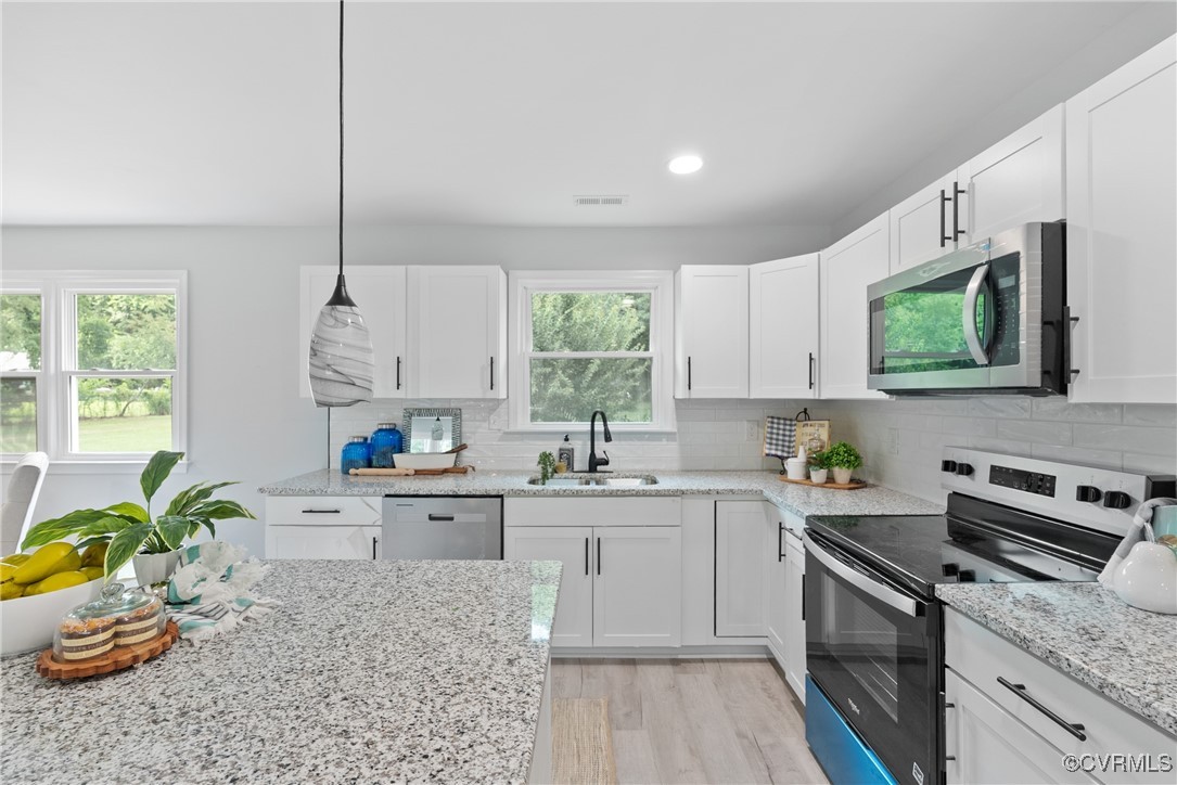 606 Bermuda Hundred Road Chester, VA 23836 - Photo 8 of 29 Kitchen with stainless steel appliances, white cab