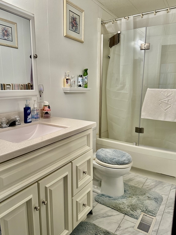45 Clems Way Acushnet, MA 02743 - Photo 15 of 18 a bathroom with a sink toilet and shower
