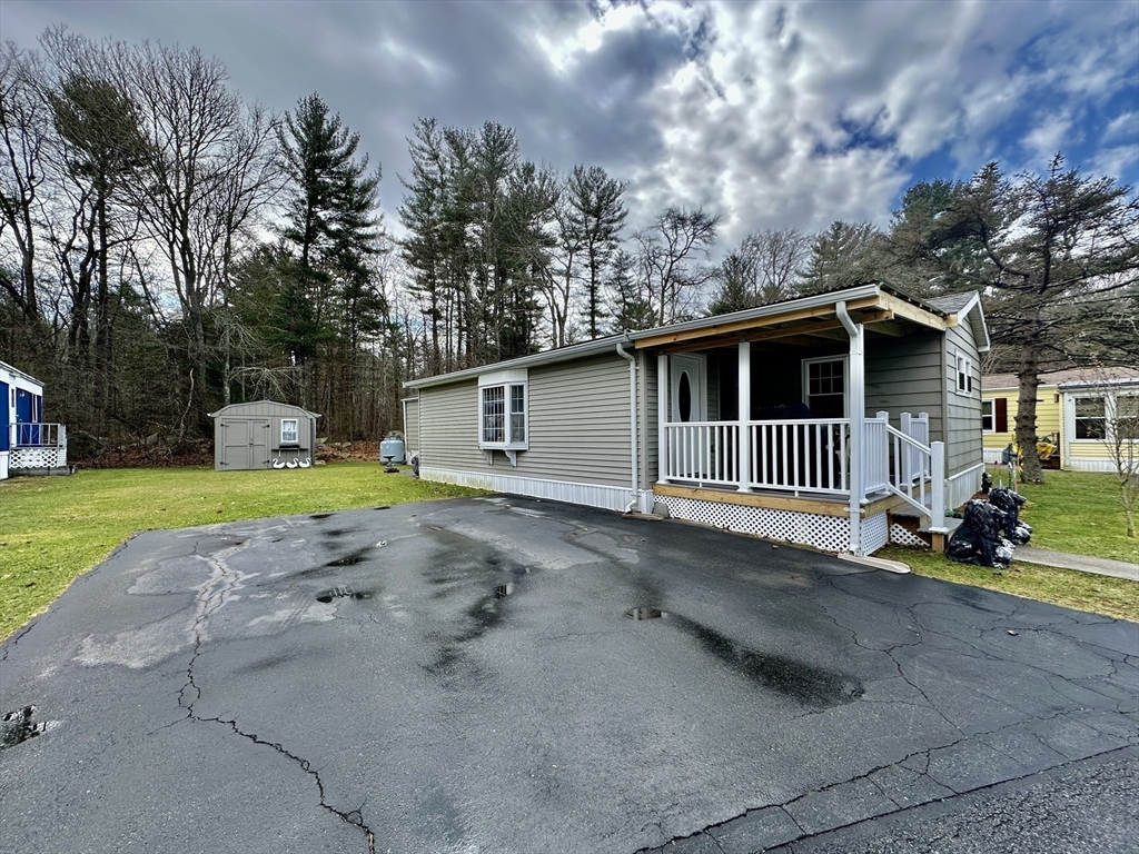 45 Clems Way Acushnet, MA 02743 - Photo 2 of 18 a view of a house with backyard and trees