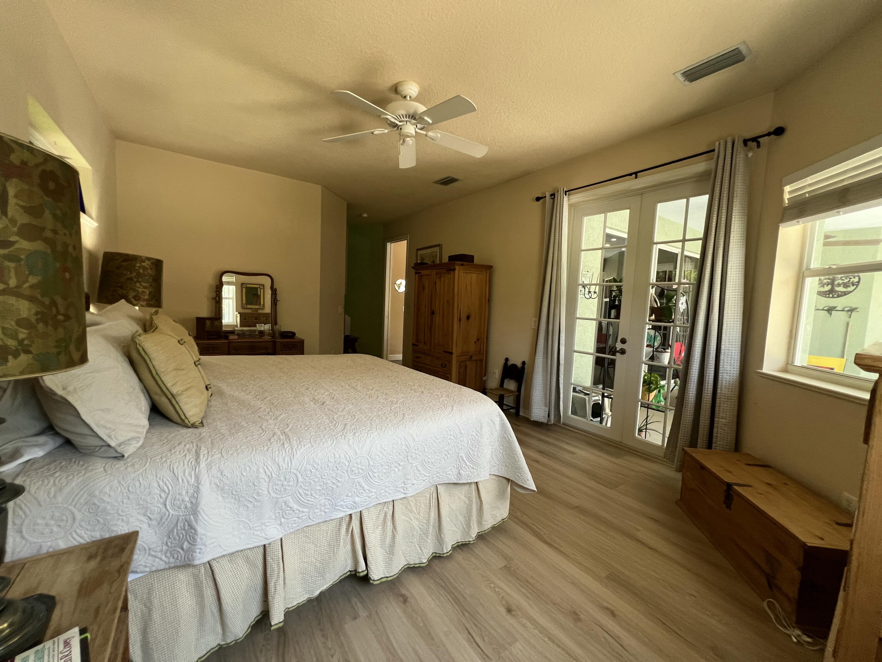 4292 Southeast Rainbows End Stuart, FL 34997 - Photo 13 of 56 side view m bedroom 4292 _2760