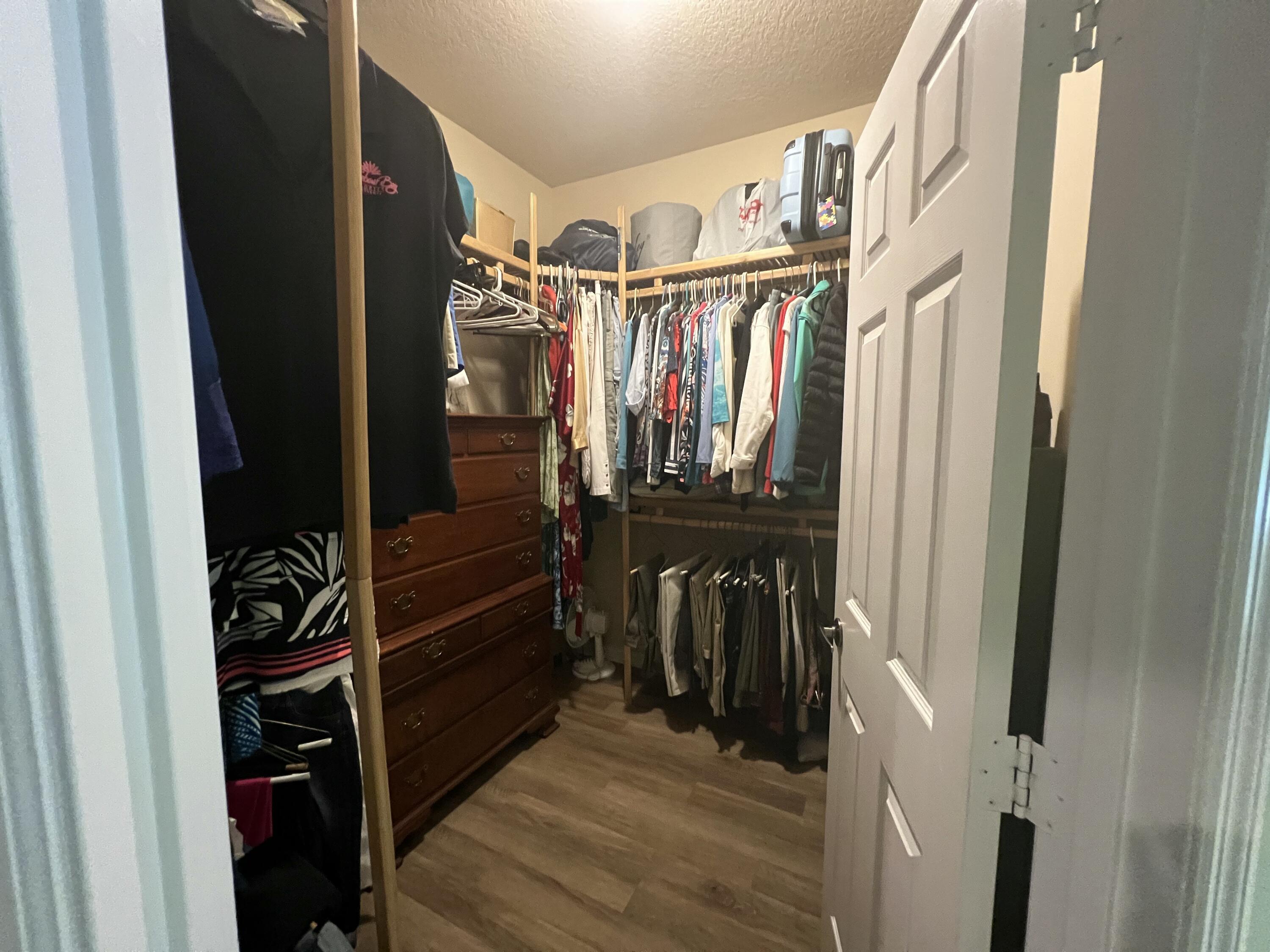 4292 Southeast Rainbows End Stuart, FL 34997 - Photo 14 of 56 Primary Closet_4539