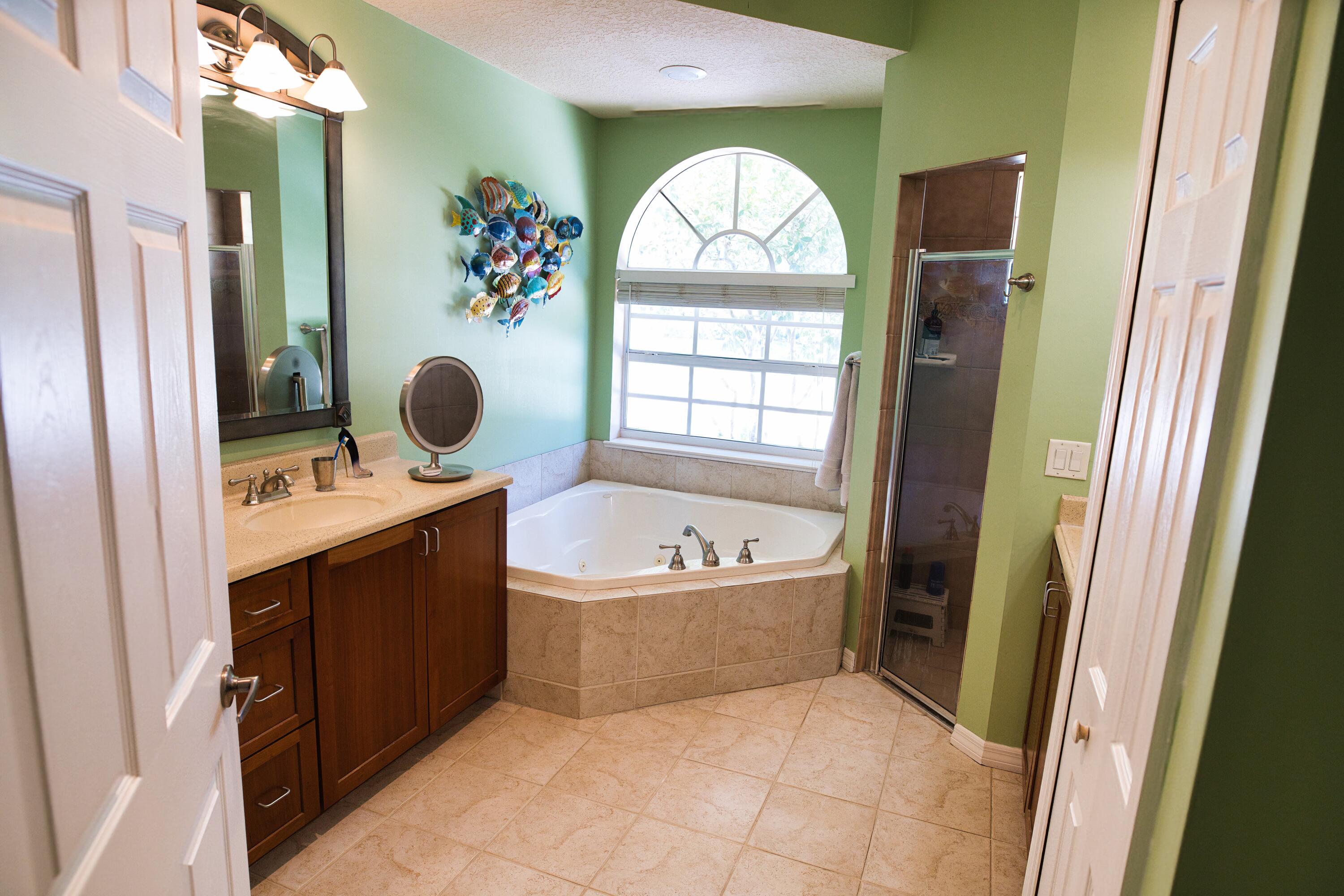 4292 Southeast Rainbows End Stuart, FL 34997 - Photo 15 of 56 1 front Primary BATH 5