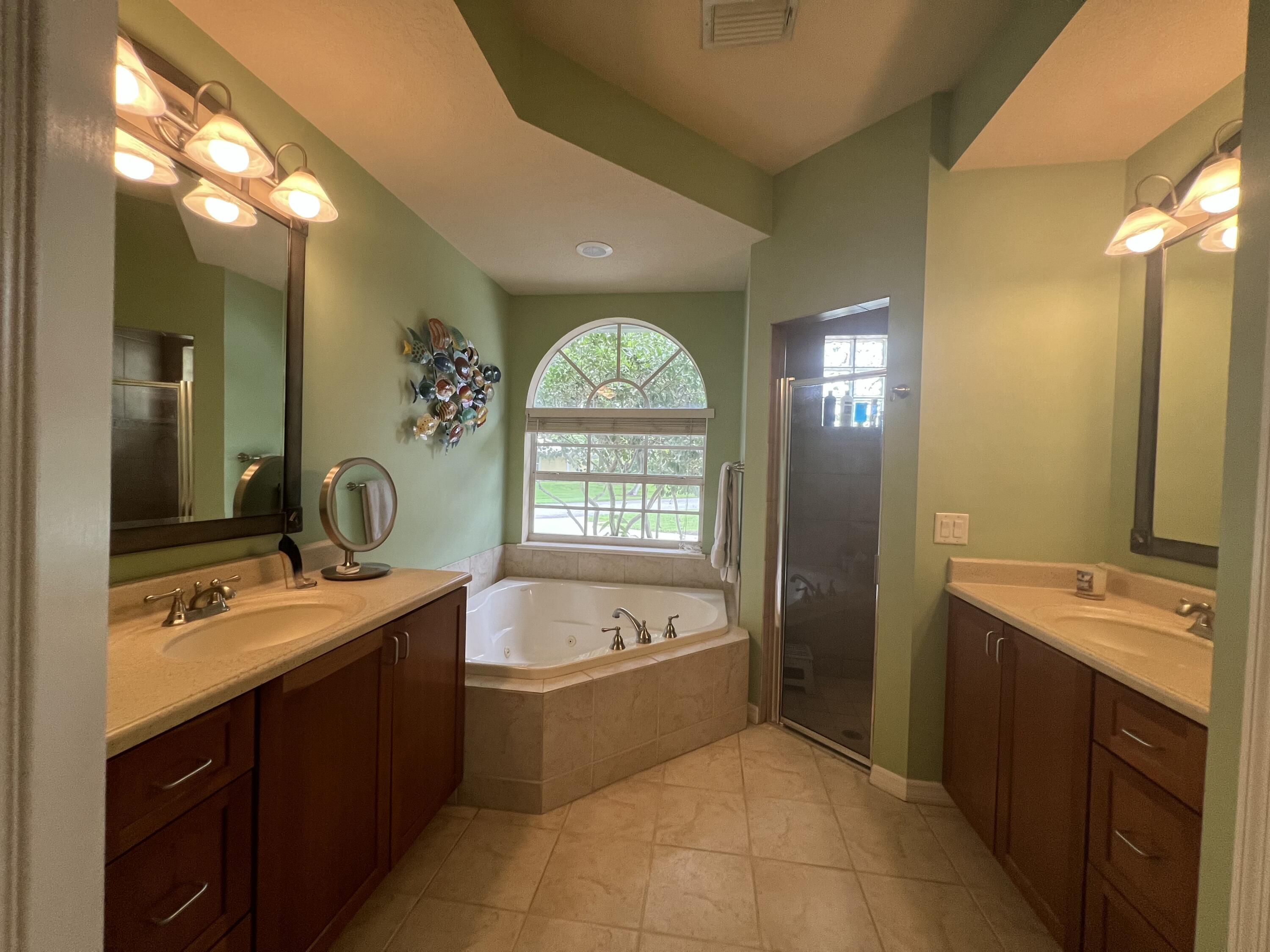 4292 Southeast Rainbows End Stuart, FL 34997 - Photo 16 of 56 Primary Bath _4538