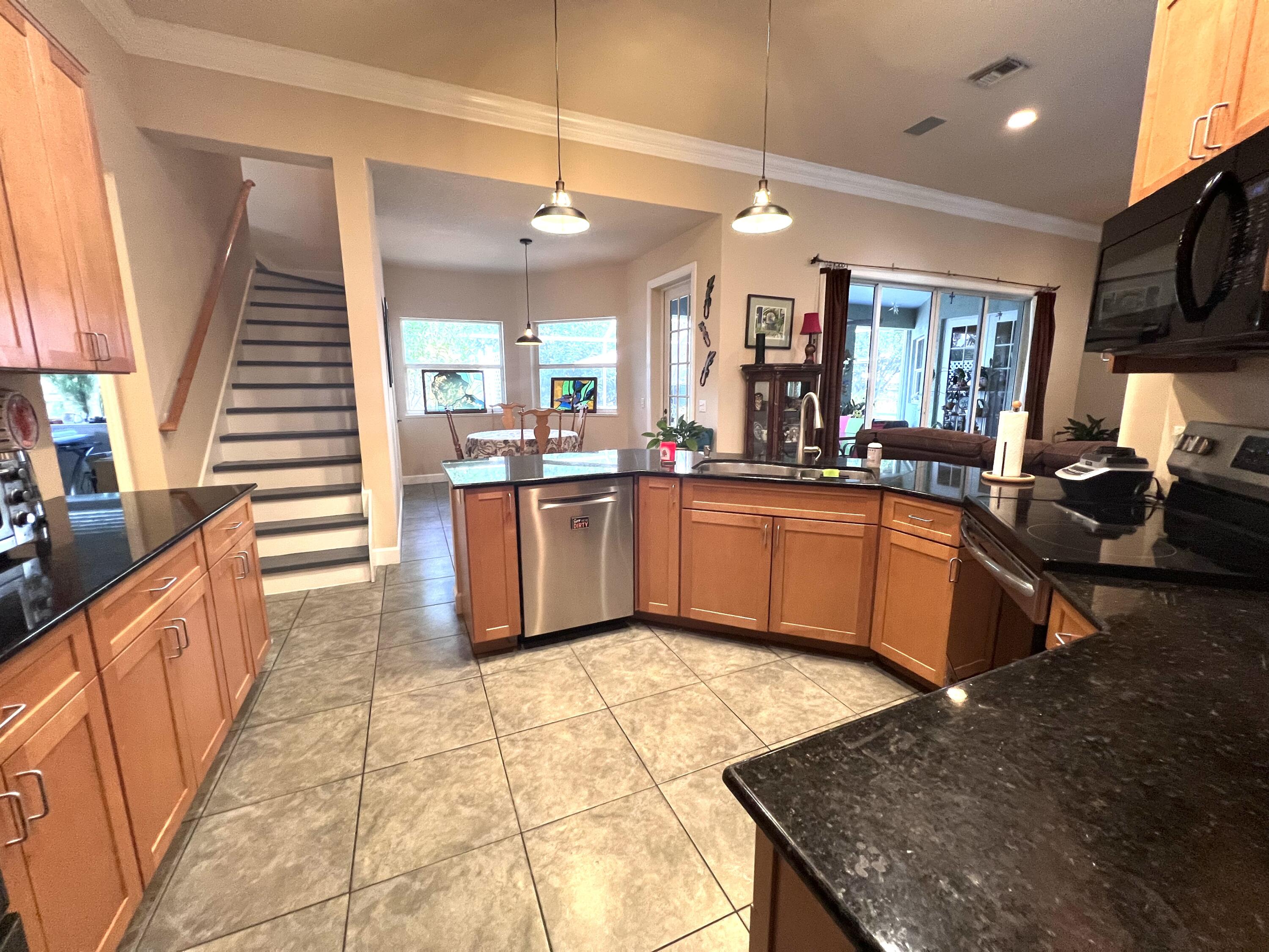 4292 Southeast Rainbows End Stuart, FL 34997 - Photo 23 of 56 Kitchen Entry 2:15_5159