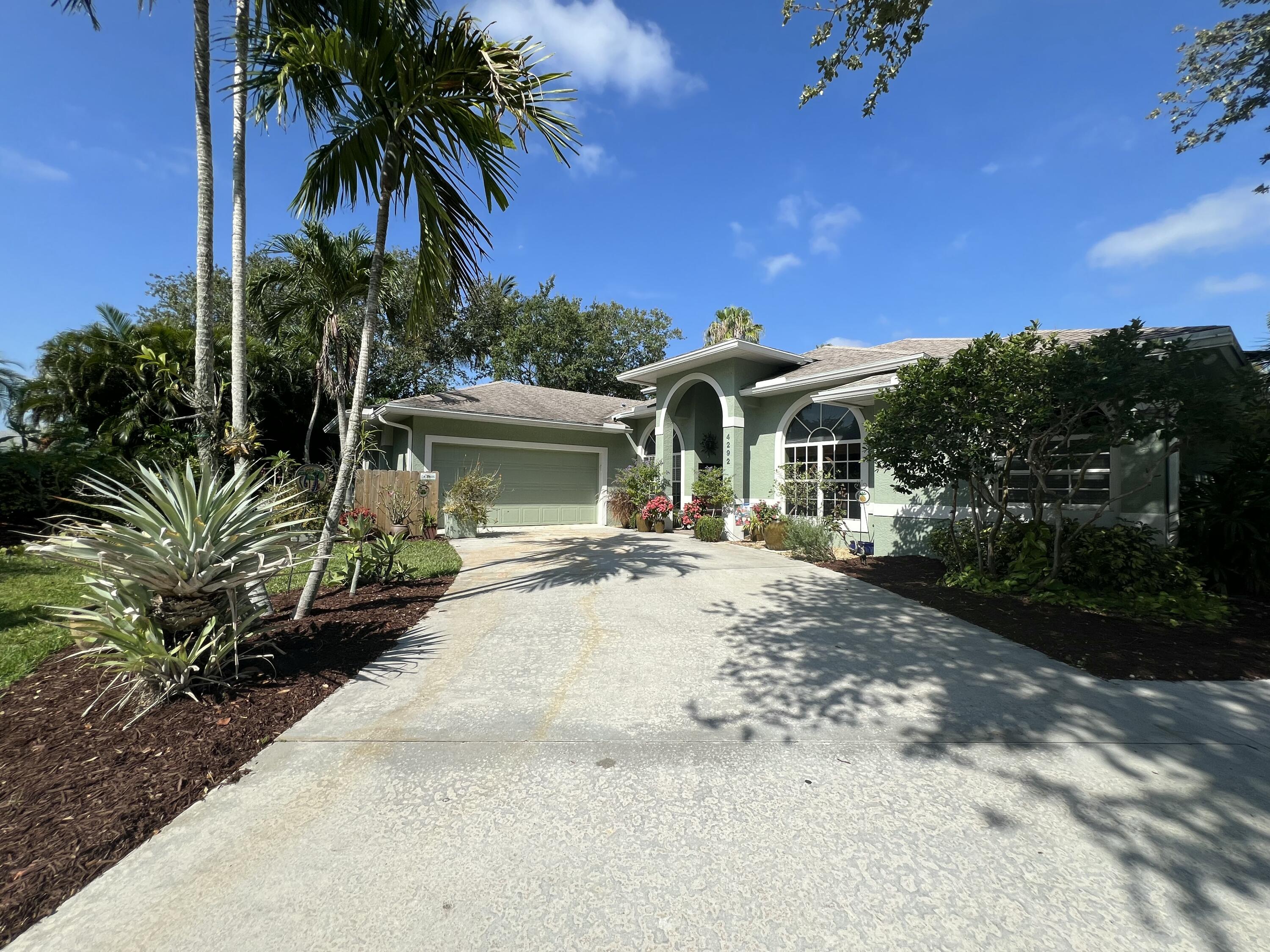4292 Southeast Rainbows End Stuart, FL 34997 - Photo 3 of 56 2 Front_2608