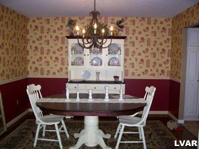 4134 Walter Road Bethlehem, PA 18020 - Photo 4 of 7 a view of a dining room with furniture and wooden floor