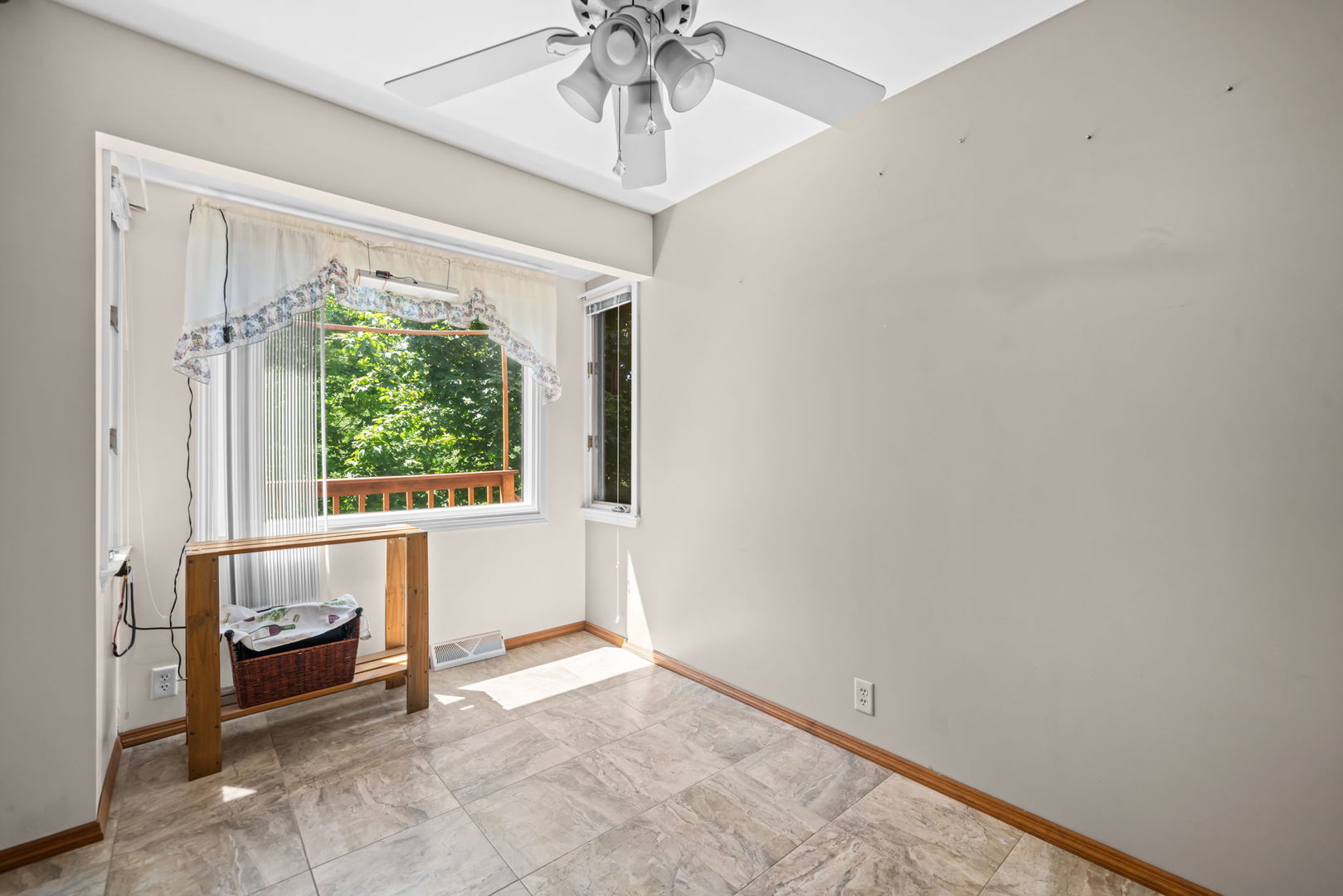 5748 South Skare Road Rochelle, IL 61068 - Photo 8 of 45 a view of an empty room with a window