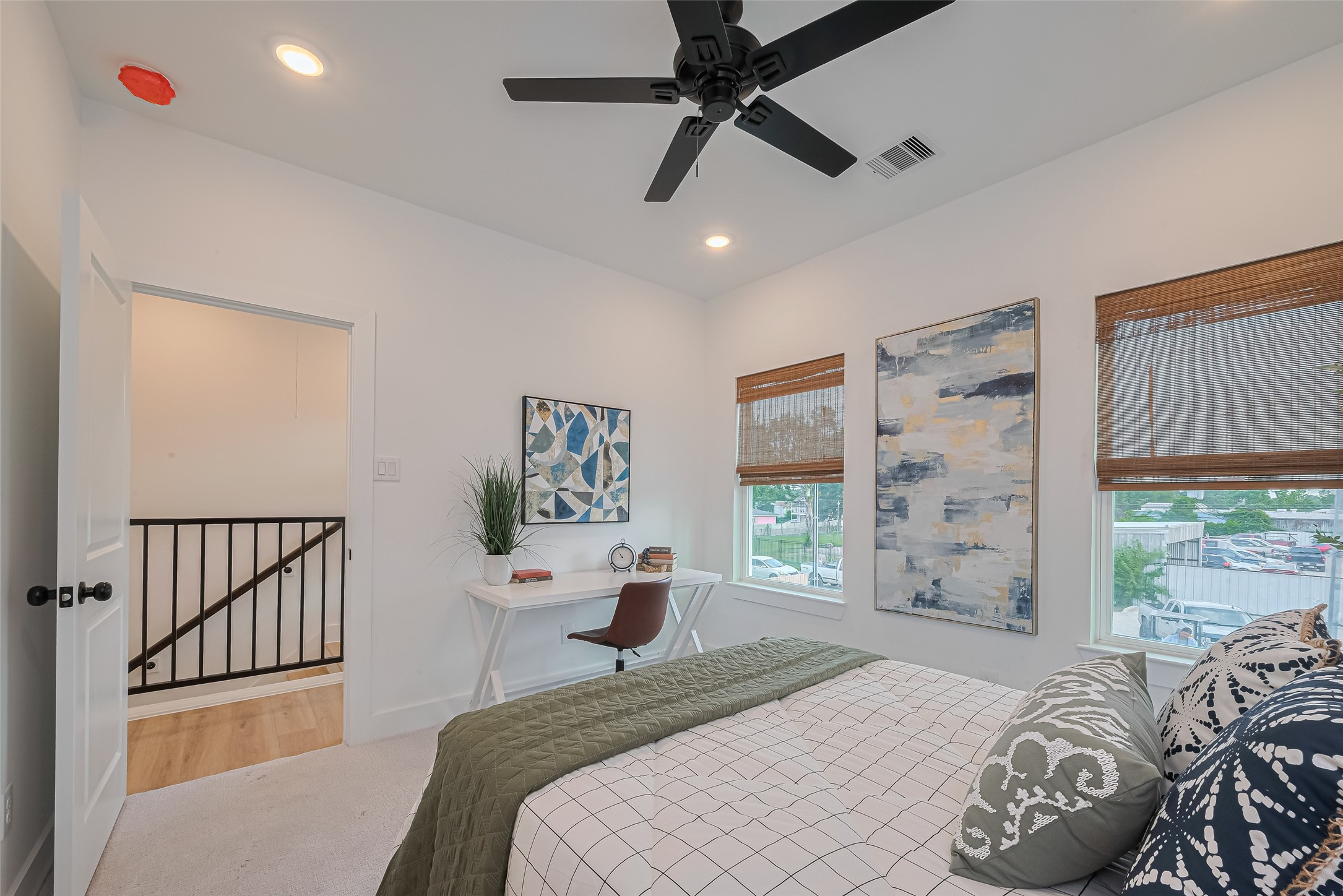 1462 Ferguson Way Houston, TX 77088 - Photo 16 of 24 a bedroom with a bed and a window