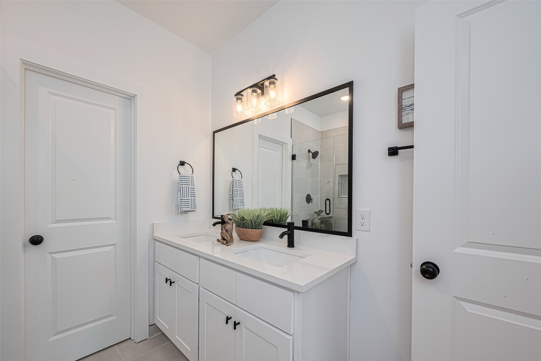 1462 Ferguson Way Houston, TX 77088 - Photo 19 of 24 a bathroom with a sink and a mirror