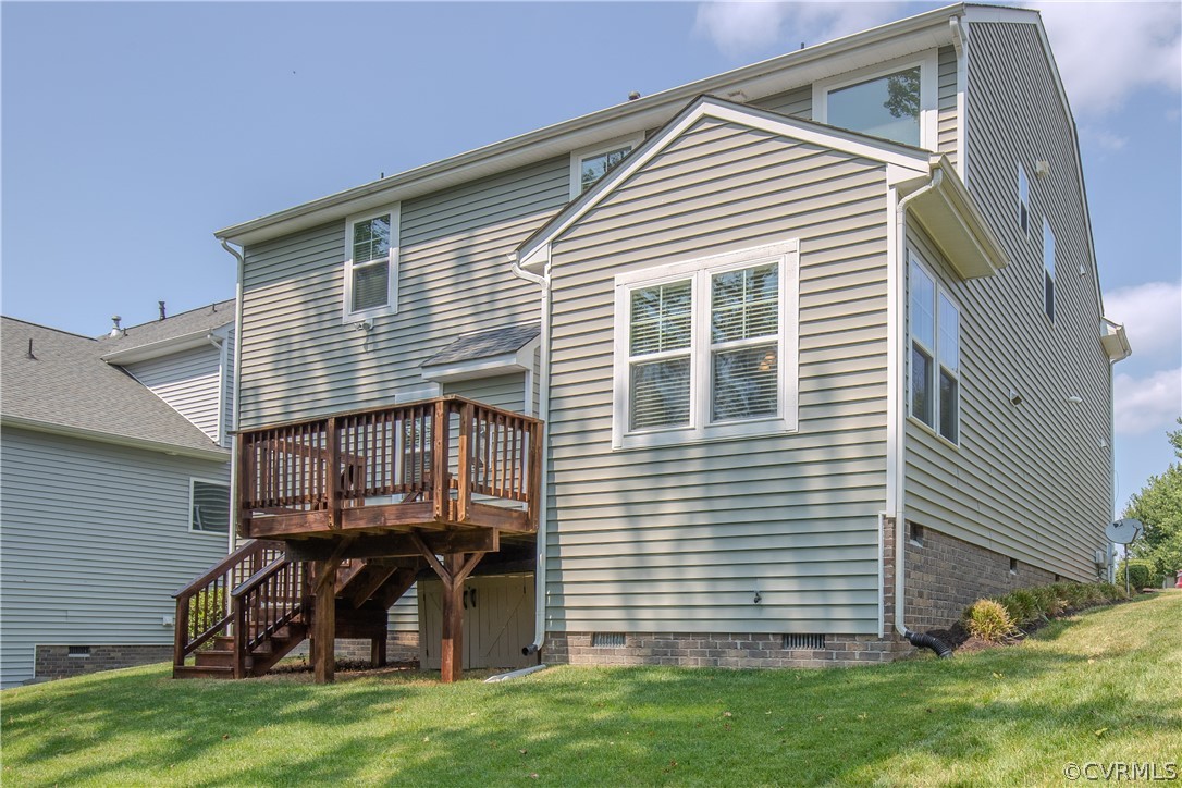 7649 Nicklaus Circle Moseley, VA 23120 - Photo 25 of 36 a view of house with a yard