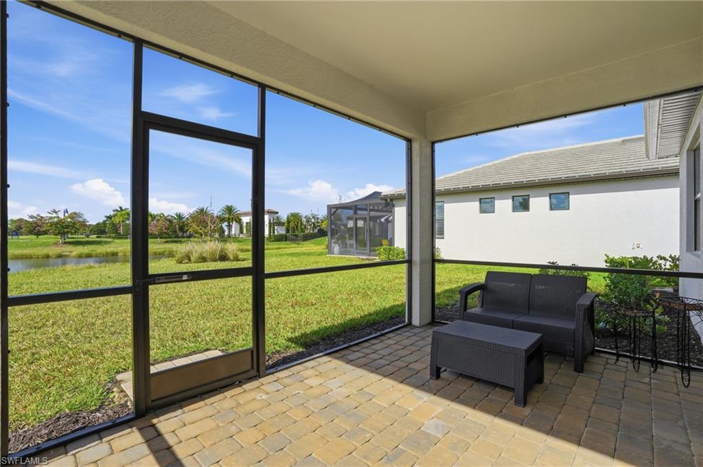 1645 Serena Avenue Naples, FL 34120 - Photo 27 of 43 a building view with outdoor space