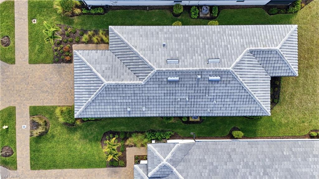 1645 Serena Avenue Naples, FL 34120 - Photo 30 of 43 a aerial view of a house with a yard