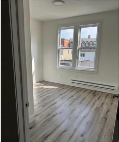a close view of a stove a sink and dishwasher in a kitchen