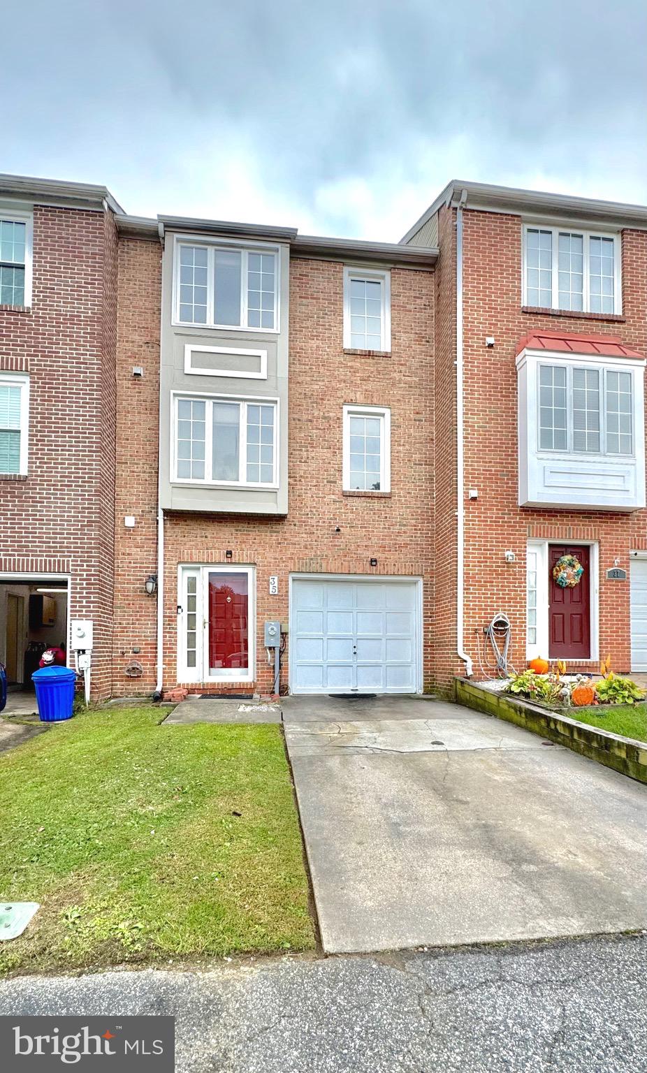 a view of an apartment with a garden