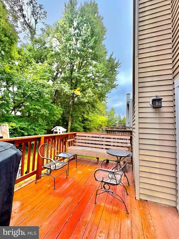 a view of swimming pool with seating space