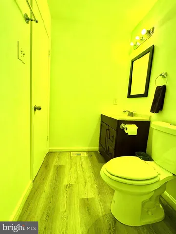 a bathroom with a toilet and a sink