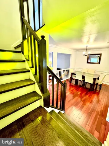 a view of swimming pool with seating area