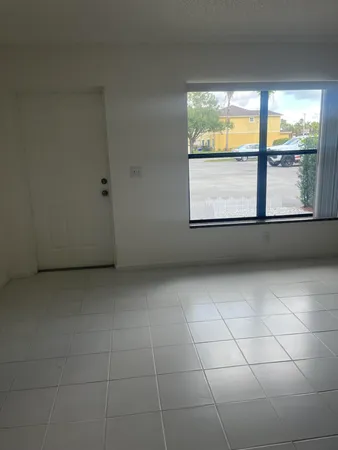an empty room with a window