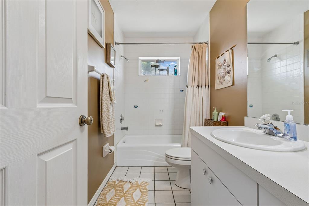 119 Burns Road Terra Ceia, FL 34250 - Photo 55 of 100 a bathroom with a sink a toilet and shower