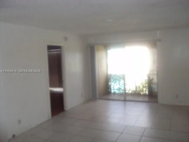 a stove top oven sitting inside of a kitchen
